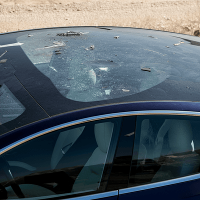 Tesla's Accidental Armor: Model Y Glass Roof Withstands Iranian Missile Debris in Israel
