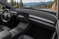 Full-cabin installation illustration of the Half-Wrapped black suede-fabric dashboard mat, with original front trim exposed and mountain scenery outside.