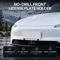 White Model Y pictured in rain with a front license plate panel, alongside no-drill mounting feature illustrations.