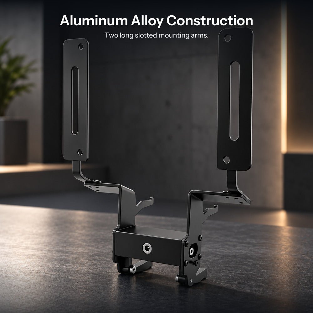 Black license plate bracket resting on a dark surface, with its upright arms and mounting hardware visible.