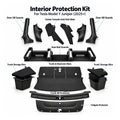 Labeled Tesla Model Y Juniper interior protection kit showing sill and seat rail guards, console mats, trunk mats, storage bins and tailgate protector.