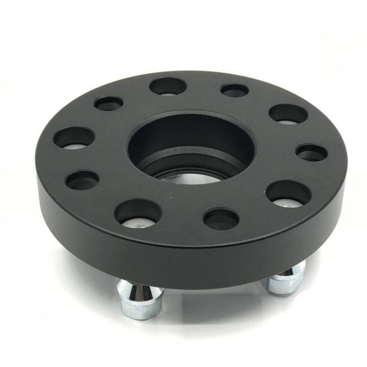 Rear mounting face of a TESERY forged wheel spacer, showing the center bore and alternating mounting holes.